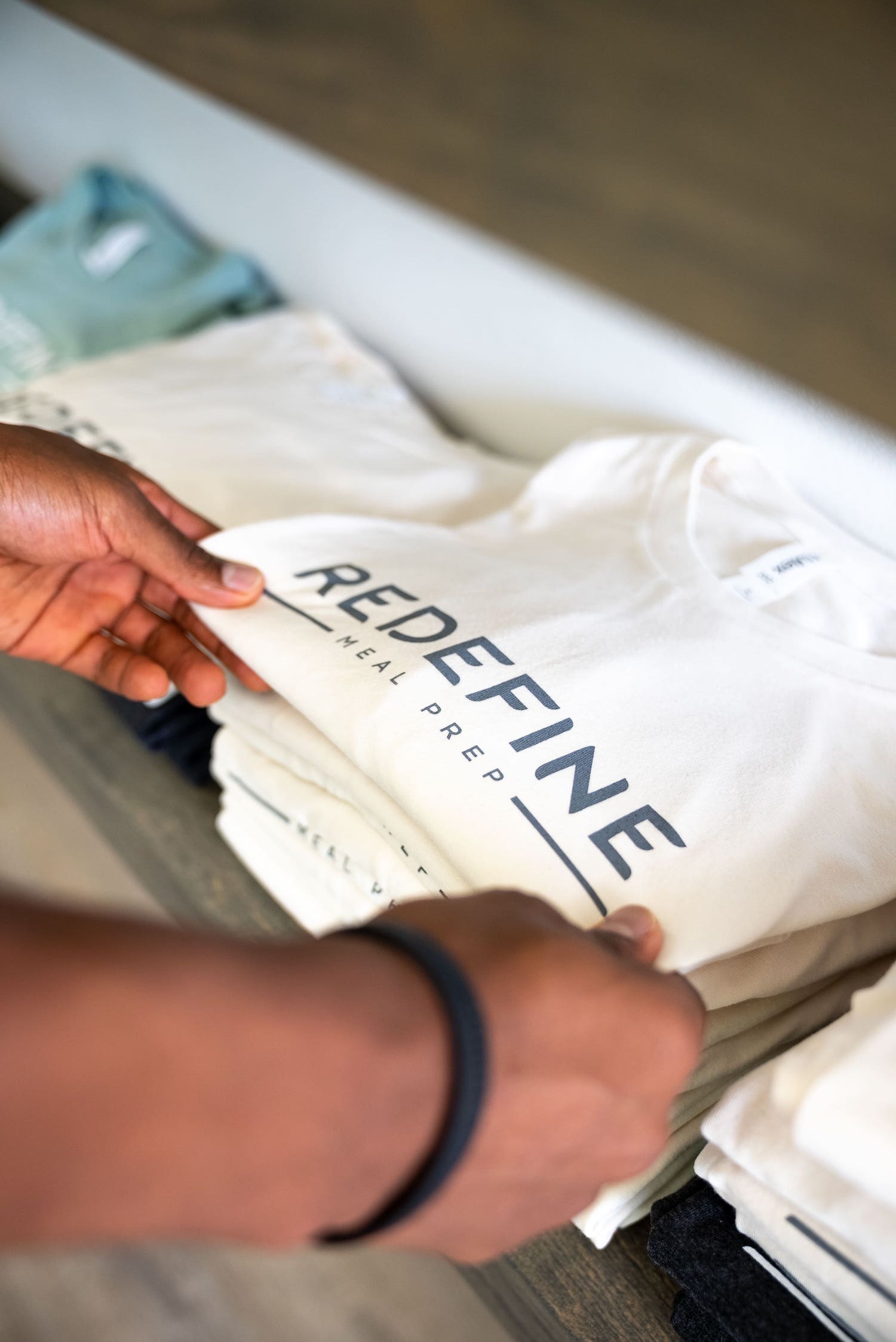 https://www.redefinemeals.com/assets/img/redesign_images/Redefine_shirt-vertical.jpg